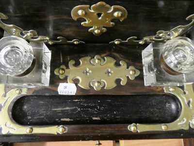Lot 146 - A Victorian coromandel wood and brass mounted inkwell/stationary desk stand with slide drawer