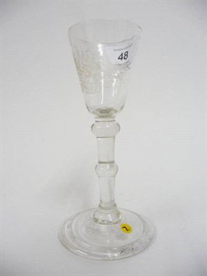 Lot 48 - A Balustroid Wine Glass, circa 1740, the round funnel bowl simply engraved with a basket of flowers
