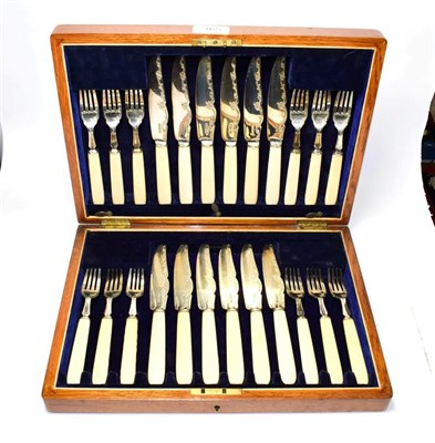 Lot 165 - A cased set of Victorian and George V silver and ivory fish-eaters, by Allen & Darwin,...