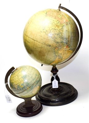 Lot 175 - Philips 9'' Terrestial Globe on an ebonised stand, and a Chad Valley tin example (2)