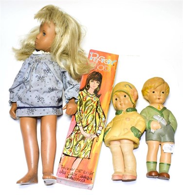 Lot 176 - Circa 1970s blonde Sasha doll wearing a blue sprigged mini dress; Peggy Mod Doll in original...