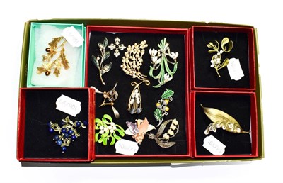 Lot 202 - Fourteen costume jewellery brooches including Michael Michaud examples; and a pair of Michael...