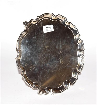 Lot 210 - A George V silver salver, by William Greenwood & Sons, Birmingham, 1932, shaped circular and on...