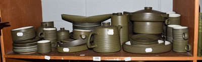 Lot 226 - A large collection of Denby Stoneware dinner and tea wares, green ground (one shelf)