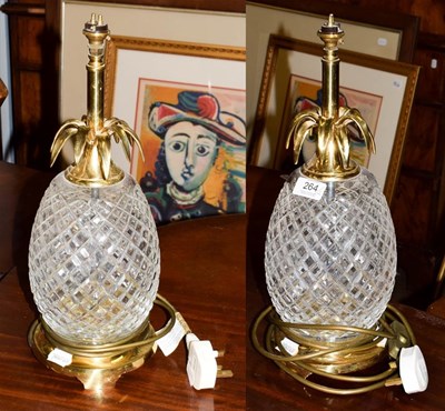 Lot 264 - A pair of Waterford crystal pineapple shaped table lamps, acid etched marks, 43cm including...