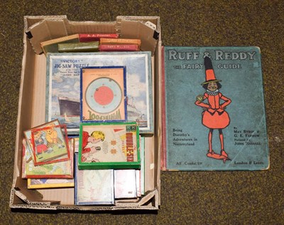 Lot 307 - Eleven metal framed puzzles, five assorted small story books, a volume of Ruff and Reddy The...