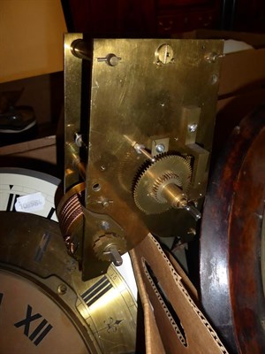 Lot 314 - A burr walnut veneered drop dial wall clock, two single fusee movements, a quantity of clock...