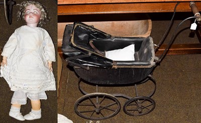 Lot 317 - Early 20th century dolls pram with leatherette hood and a large Simon & Halbig bisque socket...