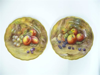 Lot 68 - A Pair of Royal Worcester Porcelain Cabinet Plates, 1930, painted by H H Price with a still life of