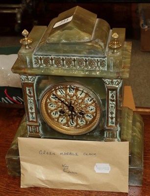 Lot 344 - A green onyx striking mantel clock, circa 1900