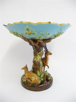 Lot 73 - A Majolica Centrepiece, circa 1870, the oak leaf moulded dish with ogee rim on tree trunk stem...