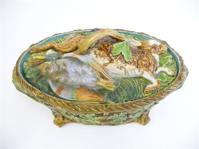 Lot 74 - A Minton Majolica Game Pie Dish and Cover, circa 1870, of basket moulded oval form, the cover...