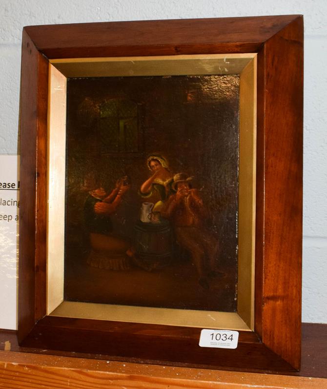 Lot 1034 - After van Ostade, Figures merry making in a tavern, oil on panel, 24.5cm by 19cm