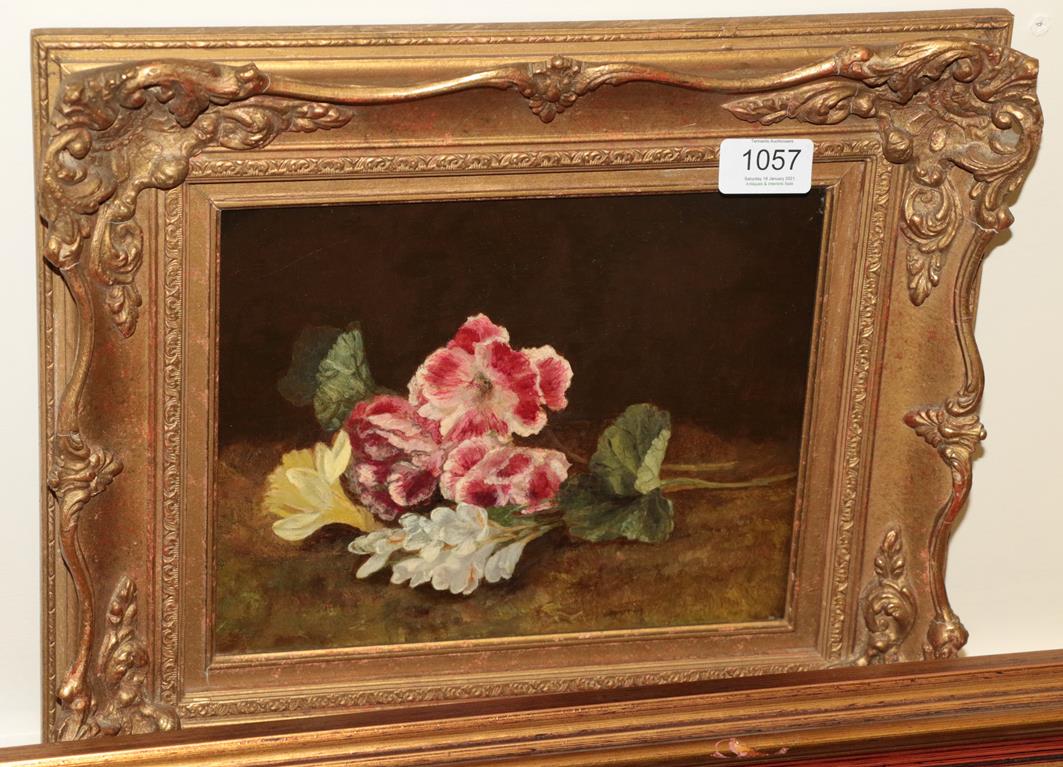 Lot 1057 - British School, 19th century, Still life of flowers on a mossy bank, oil on canvas