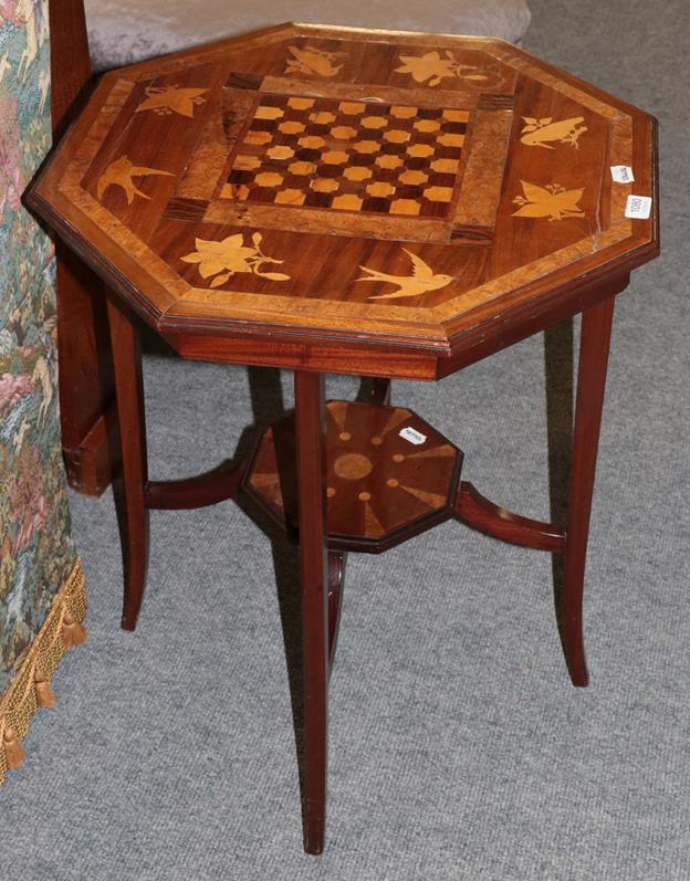 Lot 1080 - A late Victorian parquetry decorated occasional table with foliate and bird decoration on...