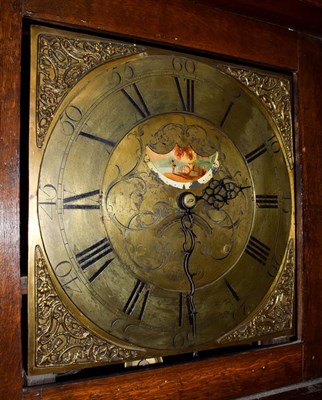 Lot 1086 - A carved oak thirty hour longcase clock, the square brass dial signed Ewbank, Elland