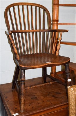 Lot 1093 - A 19th century elm Windsor chair, seat height 36cm