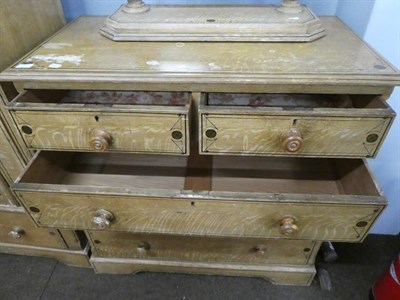 Lot 1096 - A five piece bedroom suite comprising a chest of drawers, wardrobe, dressing table mirror, wash...