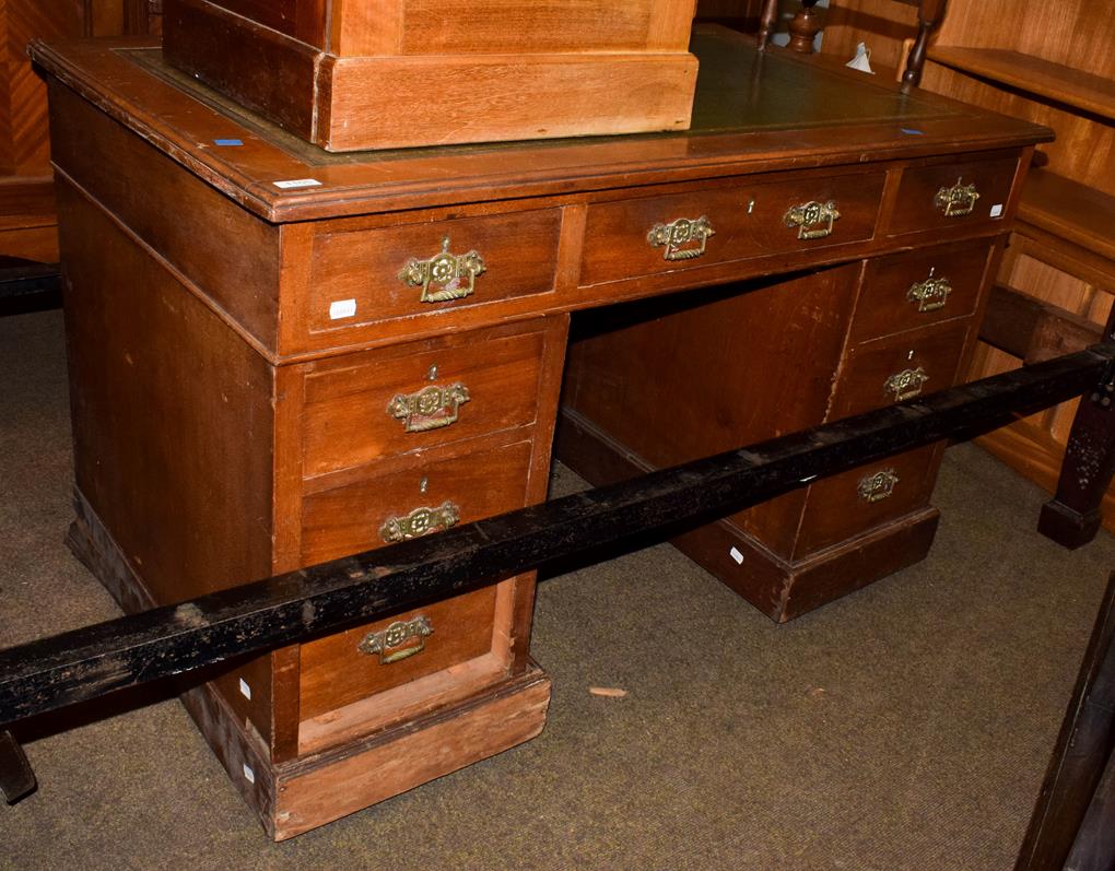 Lot 1105 - A late Victorian pedestal writing desk with attached label marked William Whiteley, London,...