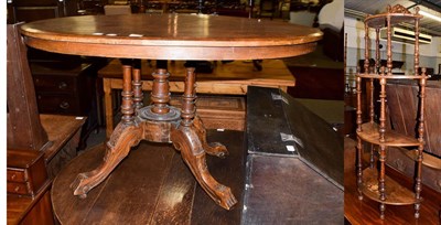 Lot 1108 - A Victorian walnut breakfast table, 117cm by 87cm by 70cm, and a Victorian walnut whatnot,...