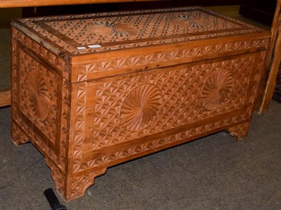 Lot 1116 - A carved camphor wood chest, 90cm by 42cm by 49cm