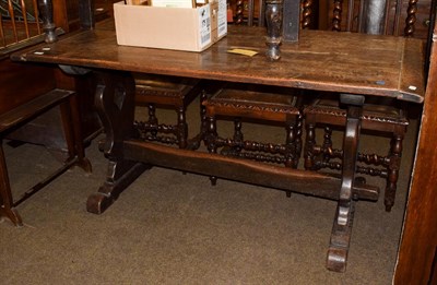 Lot 1122 - An oak refectory table, 154cm by 73cm by 76cm