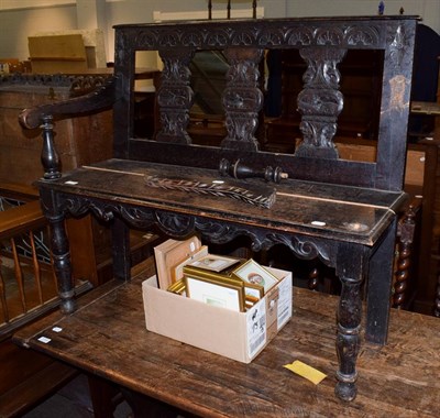 Lot 1123 - A late Victorian carved oak two seater settle, 107cm by 39cm by 95cm (a.f.)