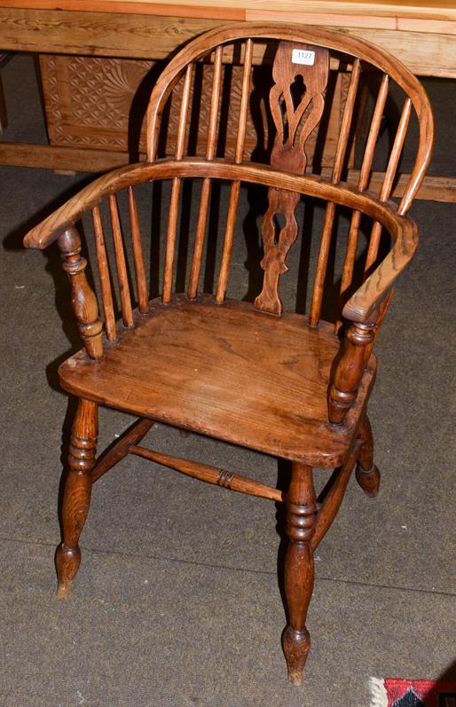 Lot 1127 - A 19th century ash and elm Windsor chair