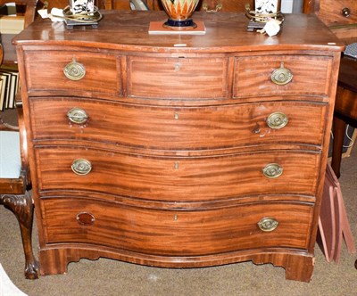 Lot 1137 - A George III mahogany serpentine fronted four height chest of drawers, 110cm by 59cm by 96cm high