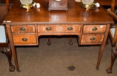 Lot 1138 - An Edwardian crossbanded and inlaid mahogany dressing table, moving on casters, 114cm by 59cm...