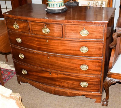 Lot 1139 - A George III bow fronted mahogany four height chest of drawers, 114cm by 60cm by 96cm