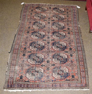Lot 1156 - Baluch rug, the field with two columns of elephant foot guls enclosed by narrow borders, 118cm...