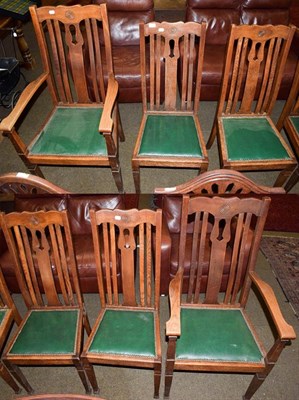 Lot 1168 - A set of six early 20th century oak dining chairs including two carvers