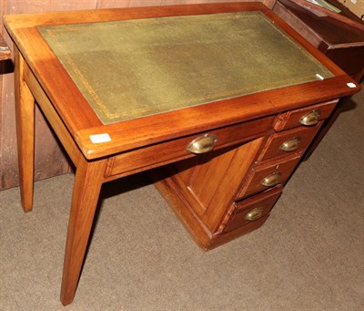 Lot 1190 - An early 20th century desk, with leather top and five drawers, 91cm by 50cm by 73cm