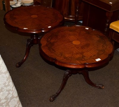Lot 1212 - A pair of inlaid mahogany tripod tables, 64cm diameter by 51cm