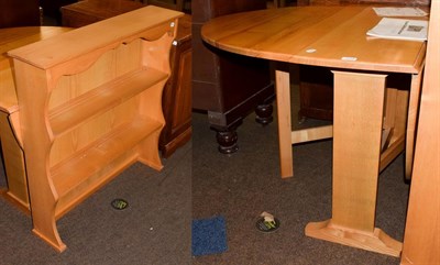Lot 1216 - A Treske solid wood drop leaf dining table, and a similar dresser rack (2)