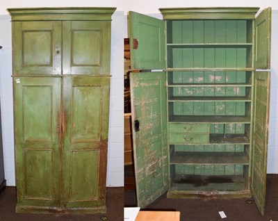 Lot 1220 - A mid 19th century green painted house keepers cupboard (in two sections) 117cm by 50cm by 240cm