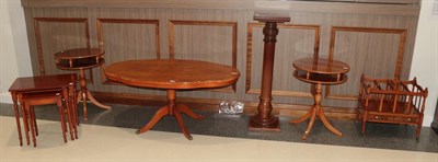 Lot 1226 - A selection of yew wood furniture comprising: a Canterbury, nest of three tables, pair of...