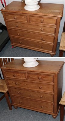 Lot 1257 - A pair of pine five drawer chests, of two short over three long graduated drawers, 91cm by 41cm...