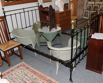 Lot 1261 - A Victorian 4ft brass and black painted iron bedstead, with brass finials, tubular frame and...
