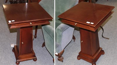 Lot 1269 - A pair of And So To Bed mahogany bedside tables, the square tops with brush slides over a...