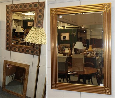 Lot 1281 - A painted arched mirror, a gilt framed mirror, a parcel gilt and part painted mirror and...