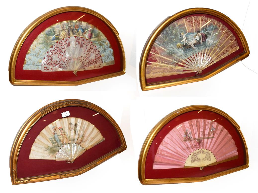 Lot 4 - ~ Four fans each in a gilt framed wall hanging display case, including one decorated with a...