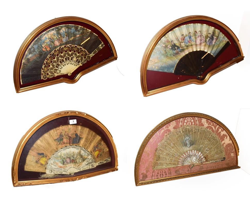 Lot 9 - ~ Four fans each in a gilt framed wall hanging display case, comprising two with bone sticks...