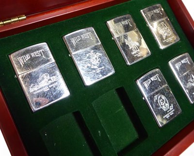 Lot 10 - ~ Five collectors display cases containing a total of thirty-eight Zippo lighters, US...