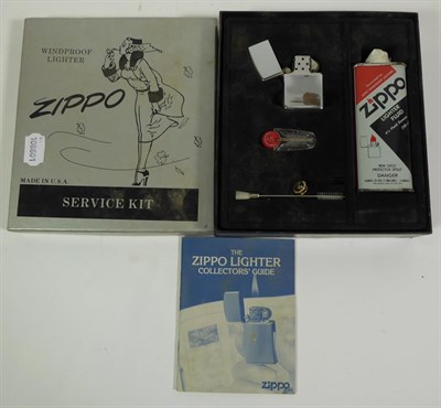 Lot 10 - ~ Five collectors display cases containing a total of thirty-eight Zippo lighters, US...