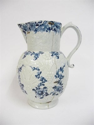 Lot 108 - A Lowestoft Porcelain Relief Moulded Baluster Jug, circa 1761, with scroll handle, painted in...