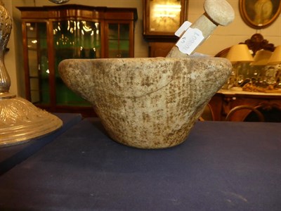 Lot 19 - ~ A white marble mortar with wooden pestle, two shipwrecked terracotta vessels and a composite...