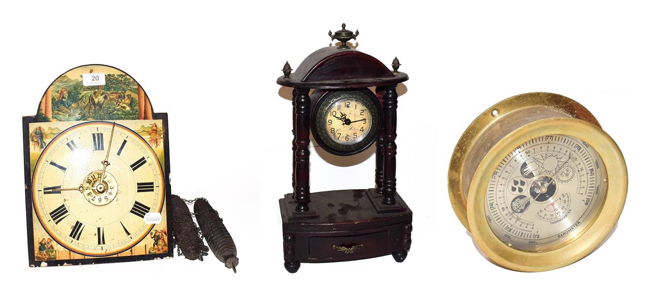 Lot 20 - ~ A Continental twin weight hanging alarm clock striking on a bell, a quartz portico mantel...