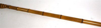Lot 31 - ~ A hawthorn walking cane incised with the coats of arms of Spanish cities dated 1883, along...